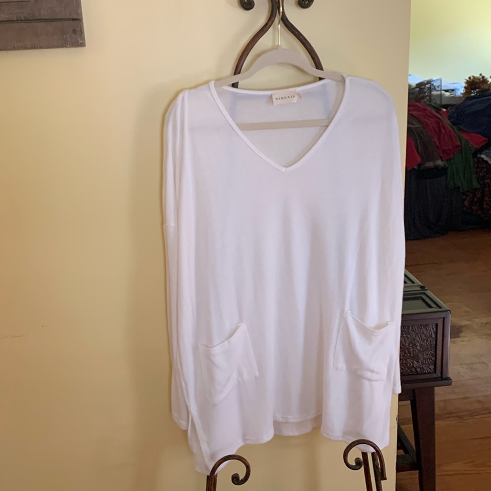 White lightweight v neck sweater.
